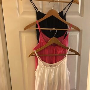 Set of three Victoria secret built-in bra tanks.